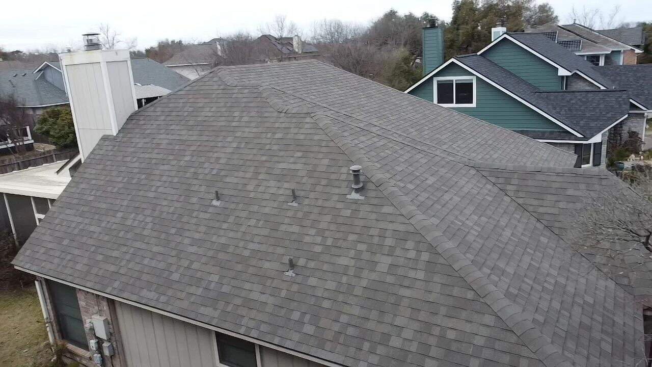 Detailed roof section with Owens Corning Oakridge Driftwood shingles installation by Dolan Roofing & Construction in Oakridge