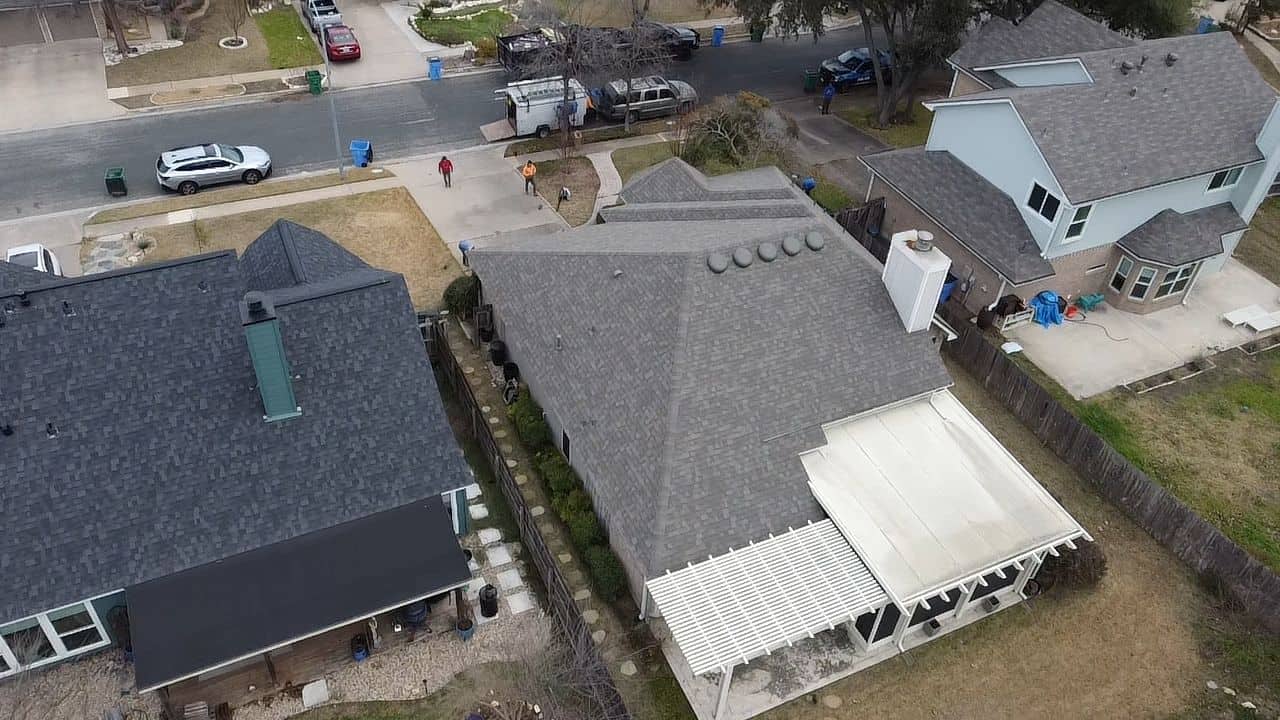 Back view of house featuring Owens Corning Oakridge Driftwood shingle roof by Dolan Roofing & Construction in Oakridge