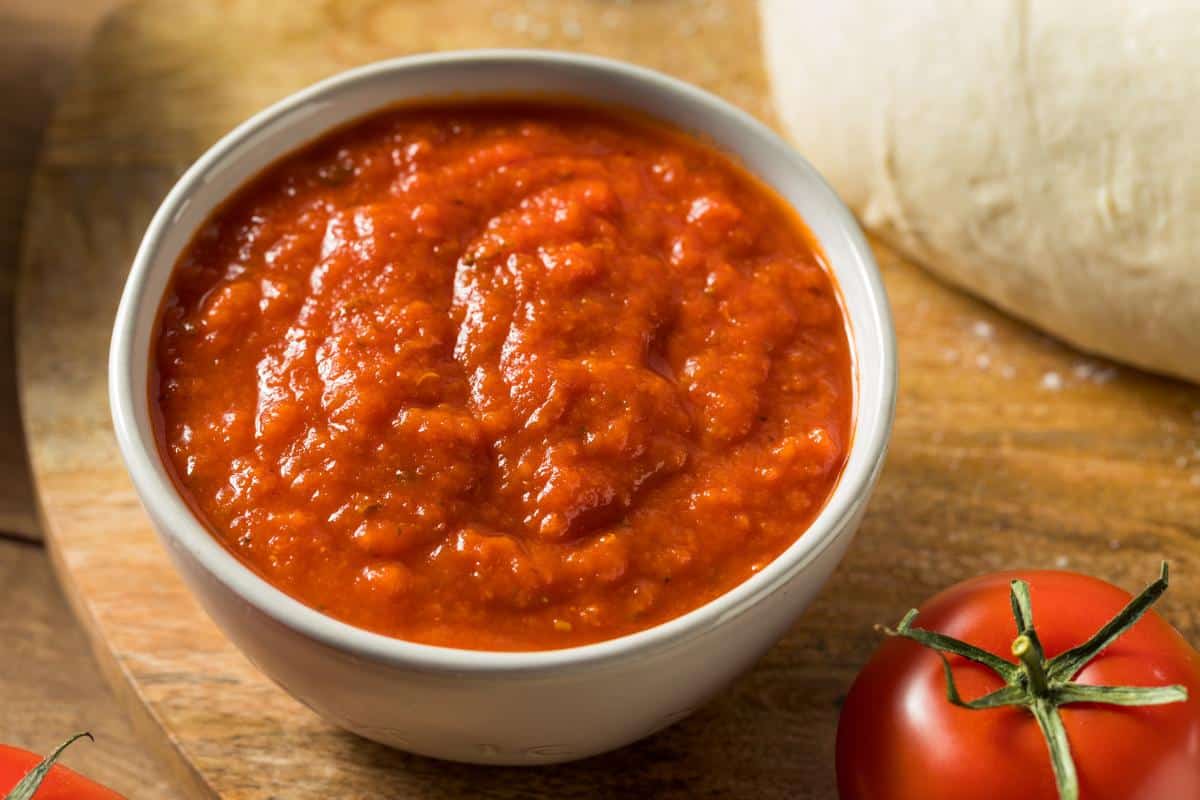 A white bowl of homemade tomato sauce.