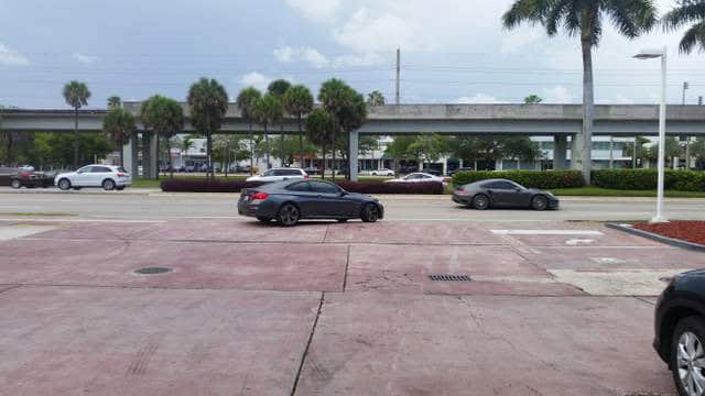 Cracks in concrete at a Coral Gables, Dade County, Florida gas station