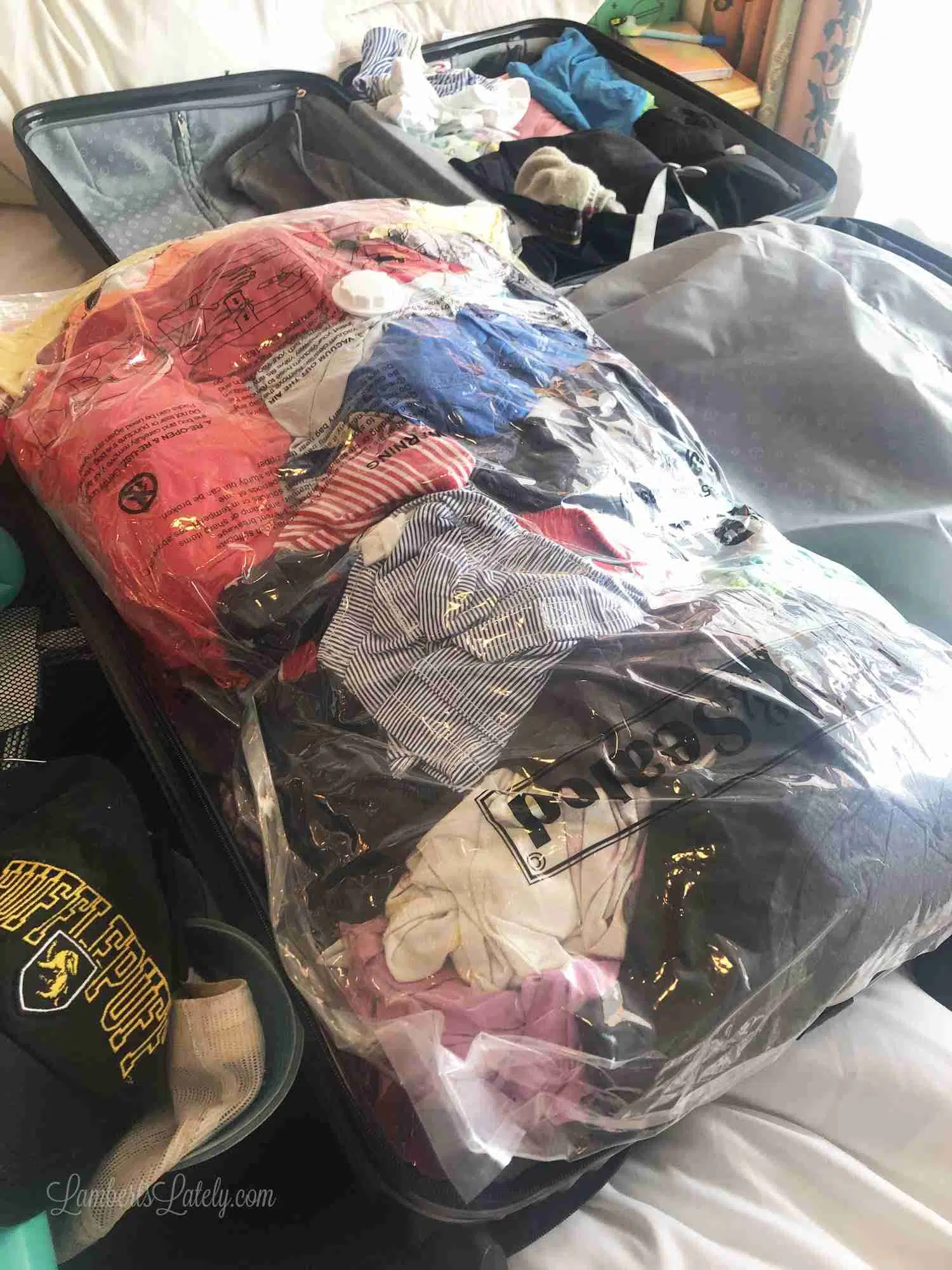 vacuum packing clothes in luggage.