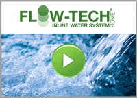 Logo for Flow-Tech Home Inline Water System above an image of flowing water, with a green play button overlayed in the center.