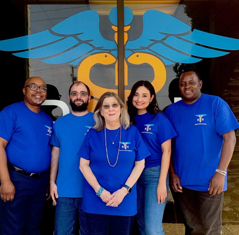 A team from Reliablenursingservices stands together, showing their caring and supportive nursing services.