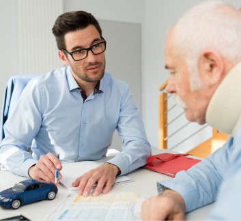 a man discussing with an injured person