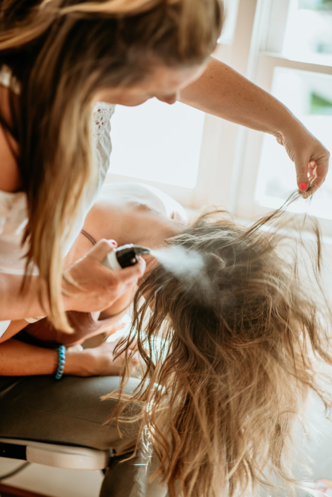 The process- bride having hair done for her Agritopia Farms wedding