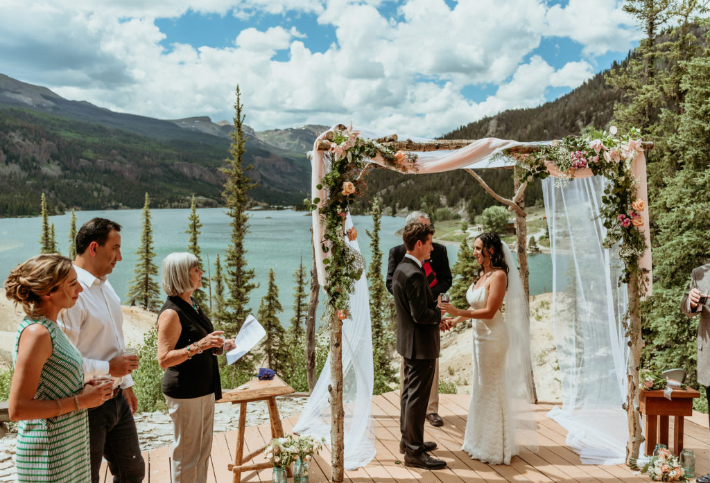 Wedding ceremony overlooking Lake San Cristobal and the San Juan Mountains in the background