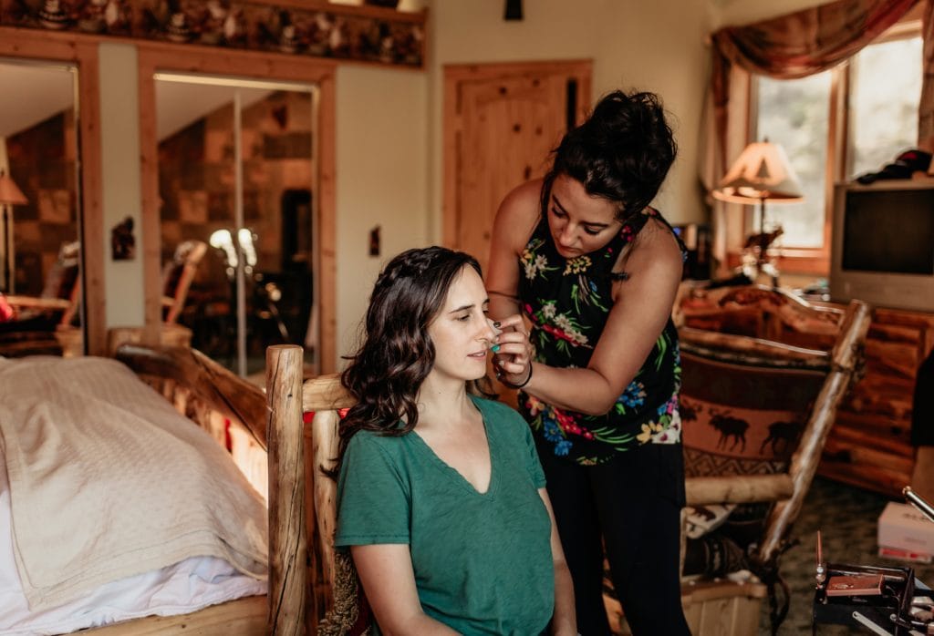 Bride having her hair and makeup done