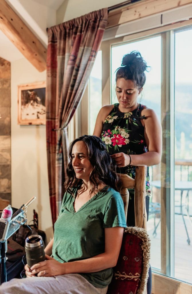 Bride having her makeup done the morning of her wedding