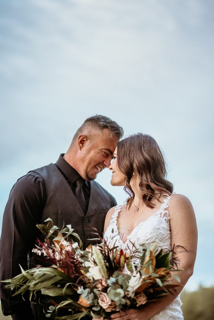 Happily married couple during their northern Arizona wedding
