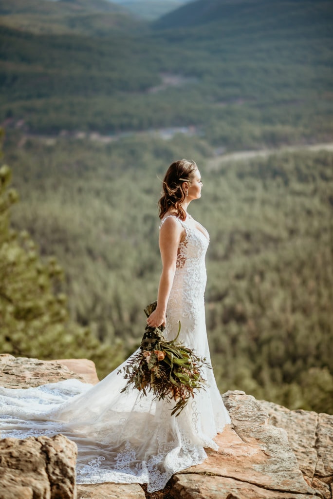 Bride facing into the sun as she stares into the distance during her northern Arizona elopement