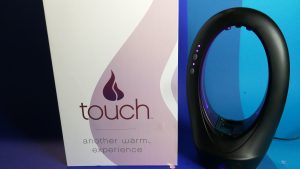 Warm touch lube dispenser