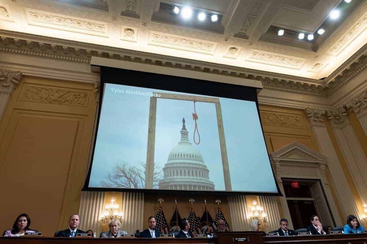 stop the steal: evolution and activities of the movement 7 Projector at the january 6th hearings showing the gallows that was erected outside the capitol that day
