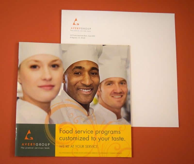 Professional food services brochure and mailing envelope.