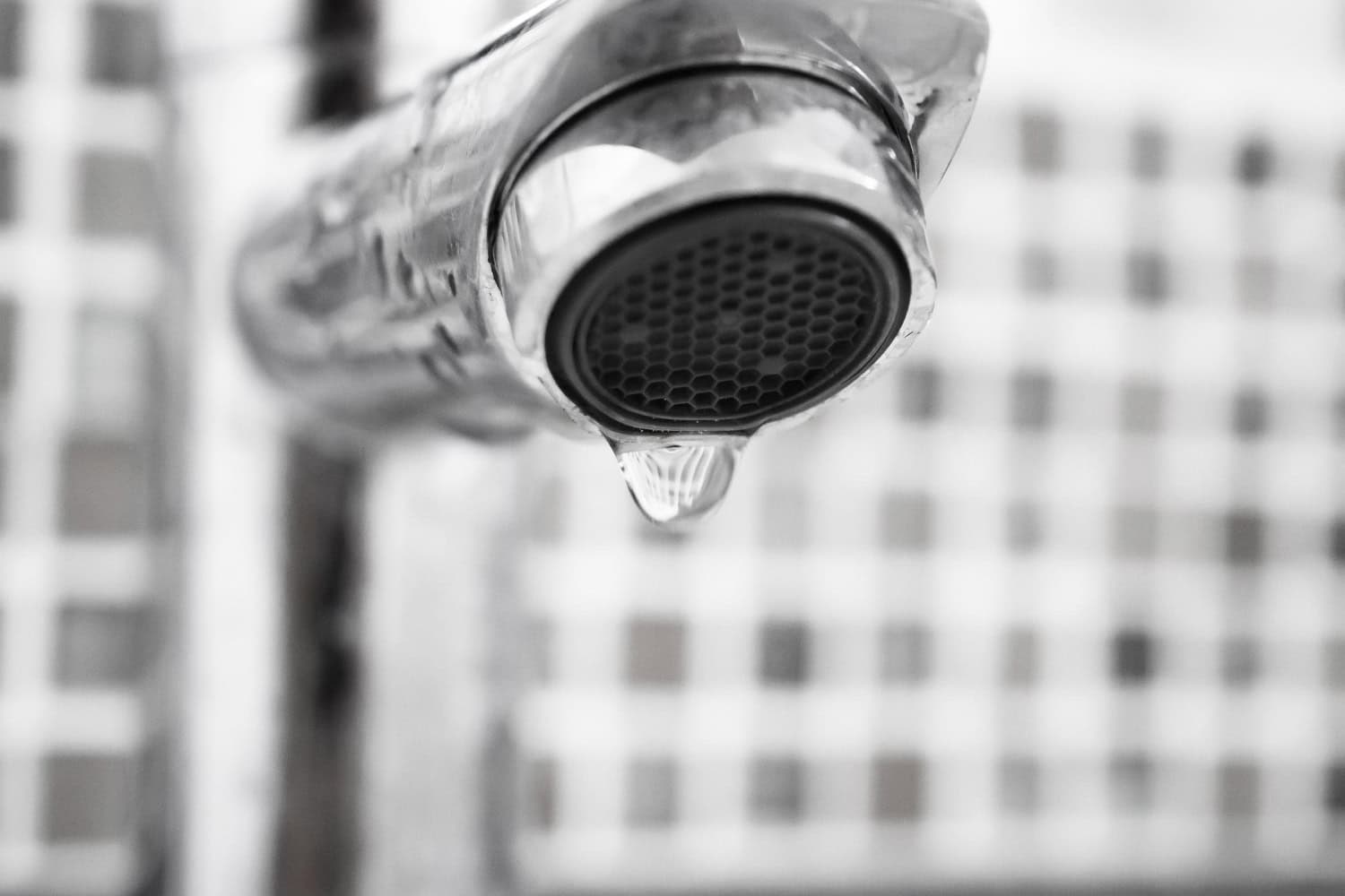 Setting kitchen and bathroom faucets to drip in vacant units can help prevent frozen pipe disasters.