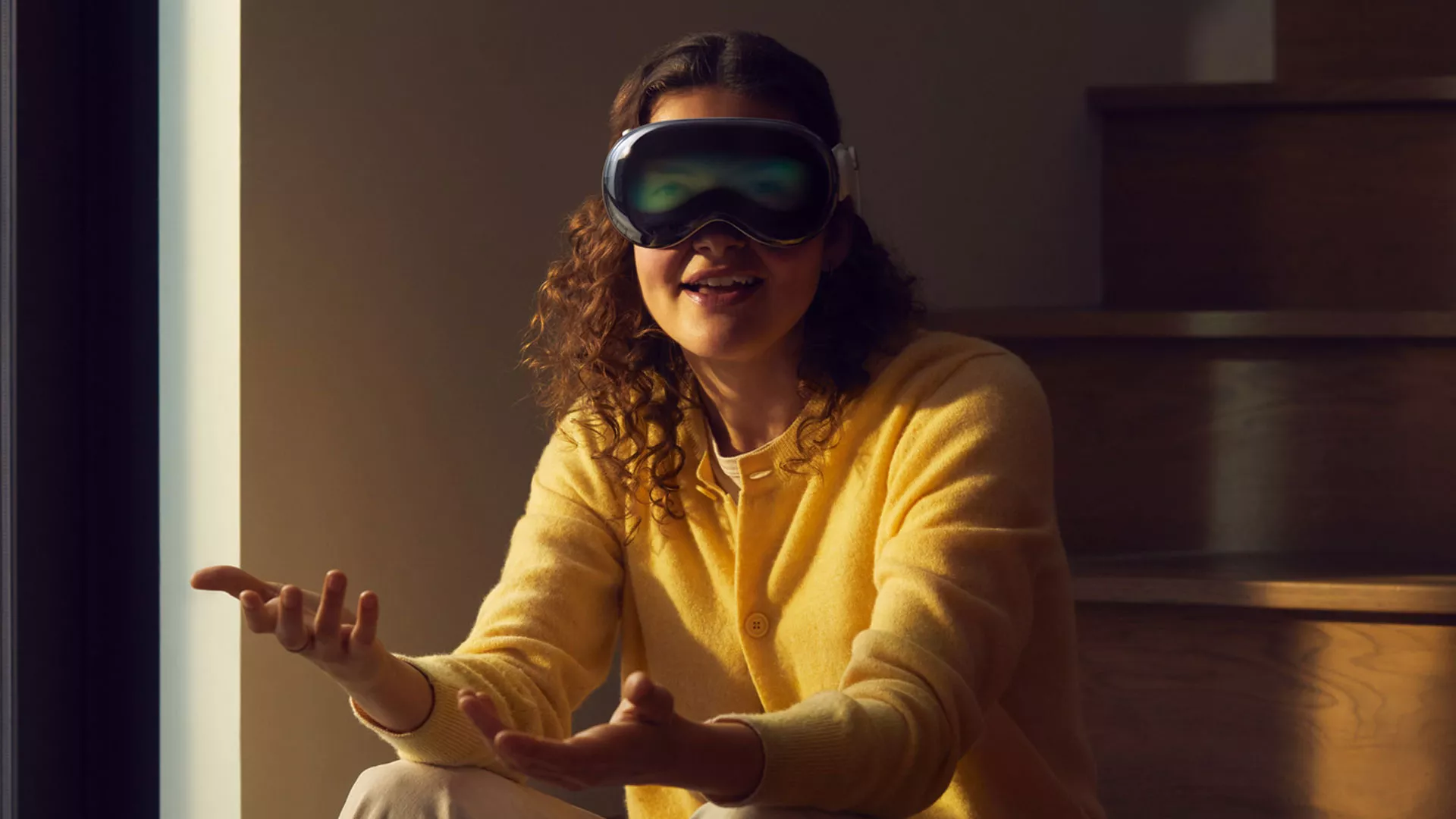 An Image Showing A Person Wearing The Apple Vision Pro Headset, Engrossed In A Mixed Reality Experience.