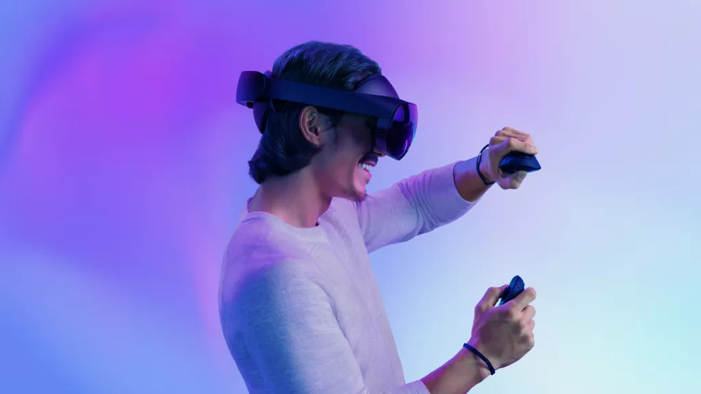 A Person Wearing A Vr Headset Immersed In A Virtual World.