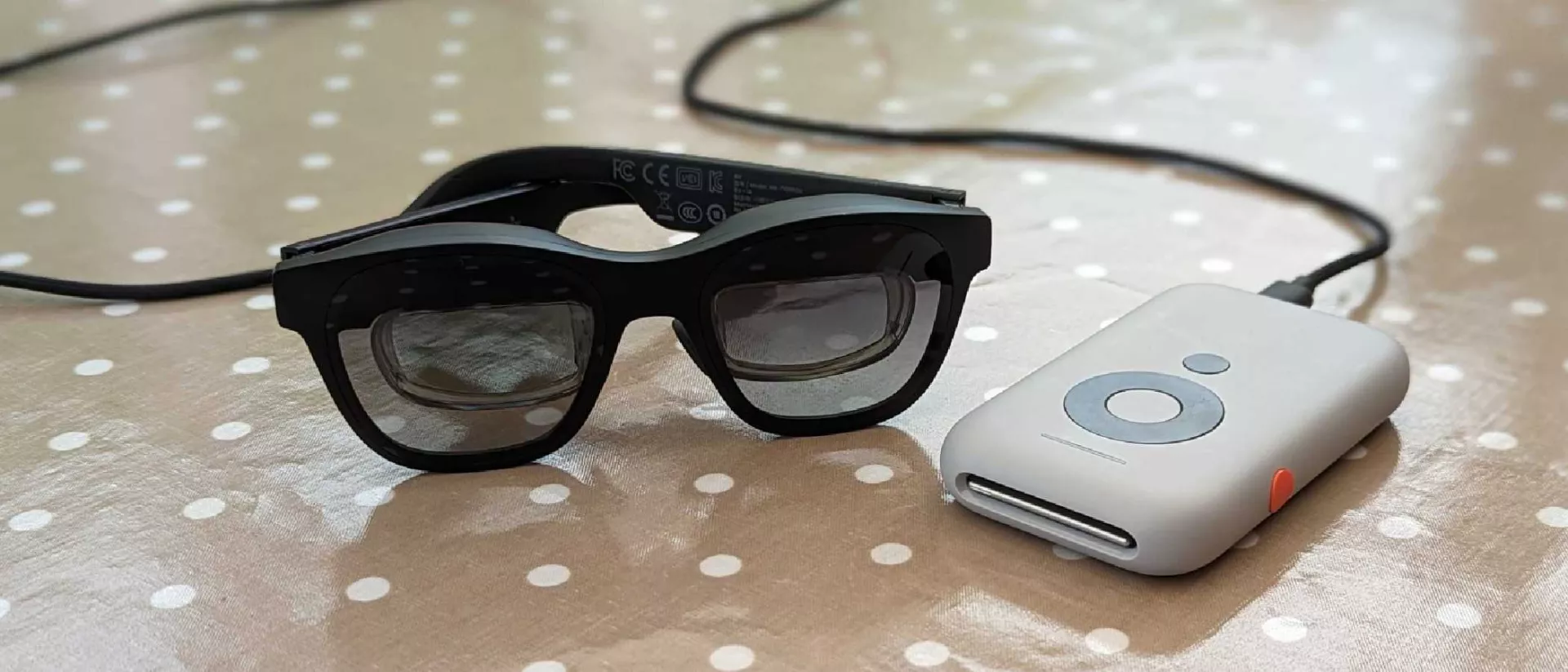 A Person Wearing Nreal Air Ar Glasses, Interacting With Virtual Objects In A Real-World Environment.