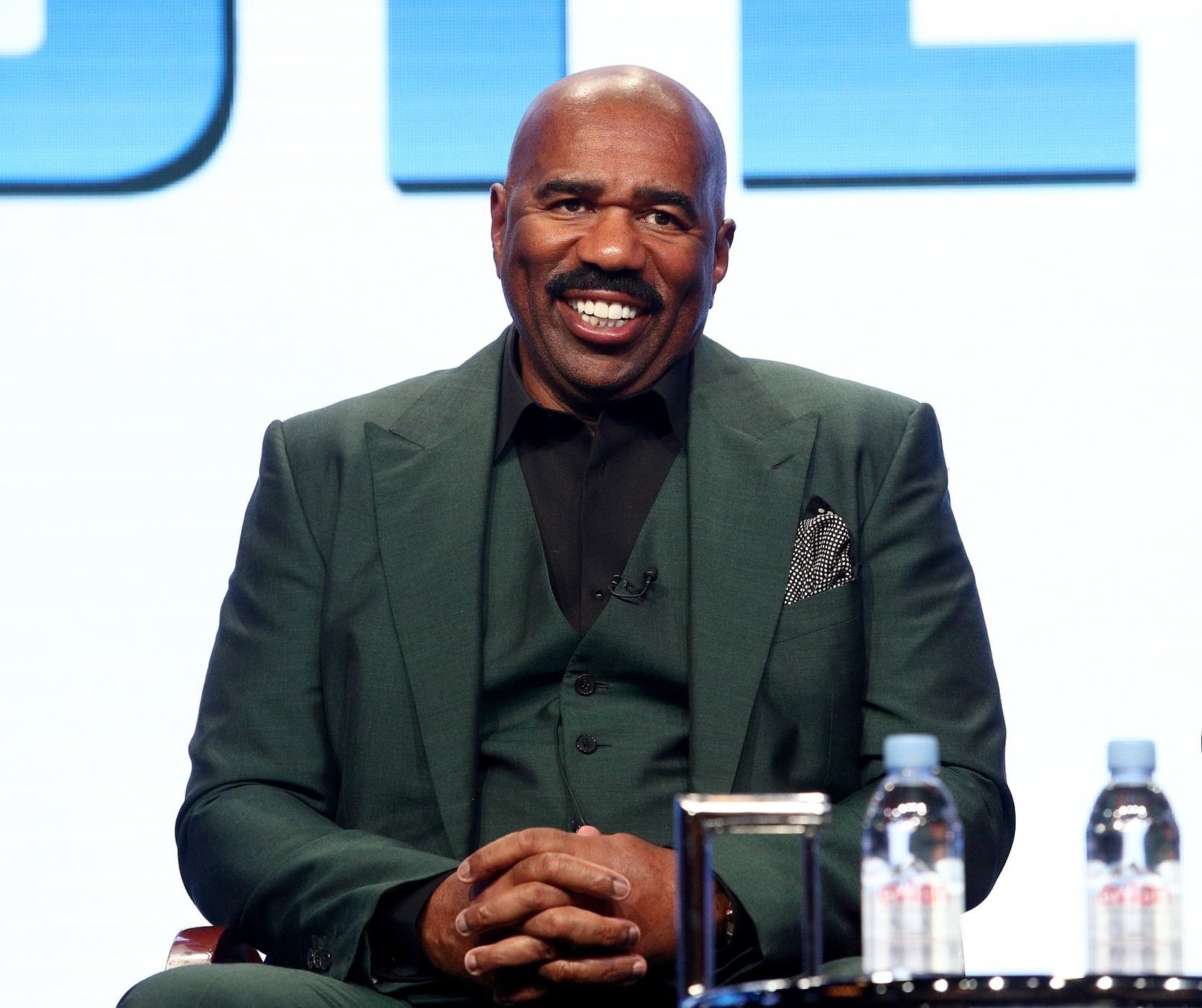 Steve Harvey On Stage, Captivating Audiences With His Humor