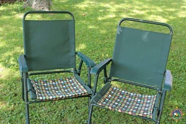 two camping chairs with covers