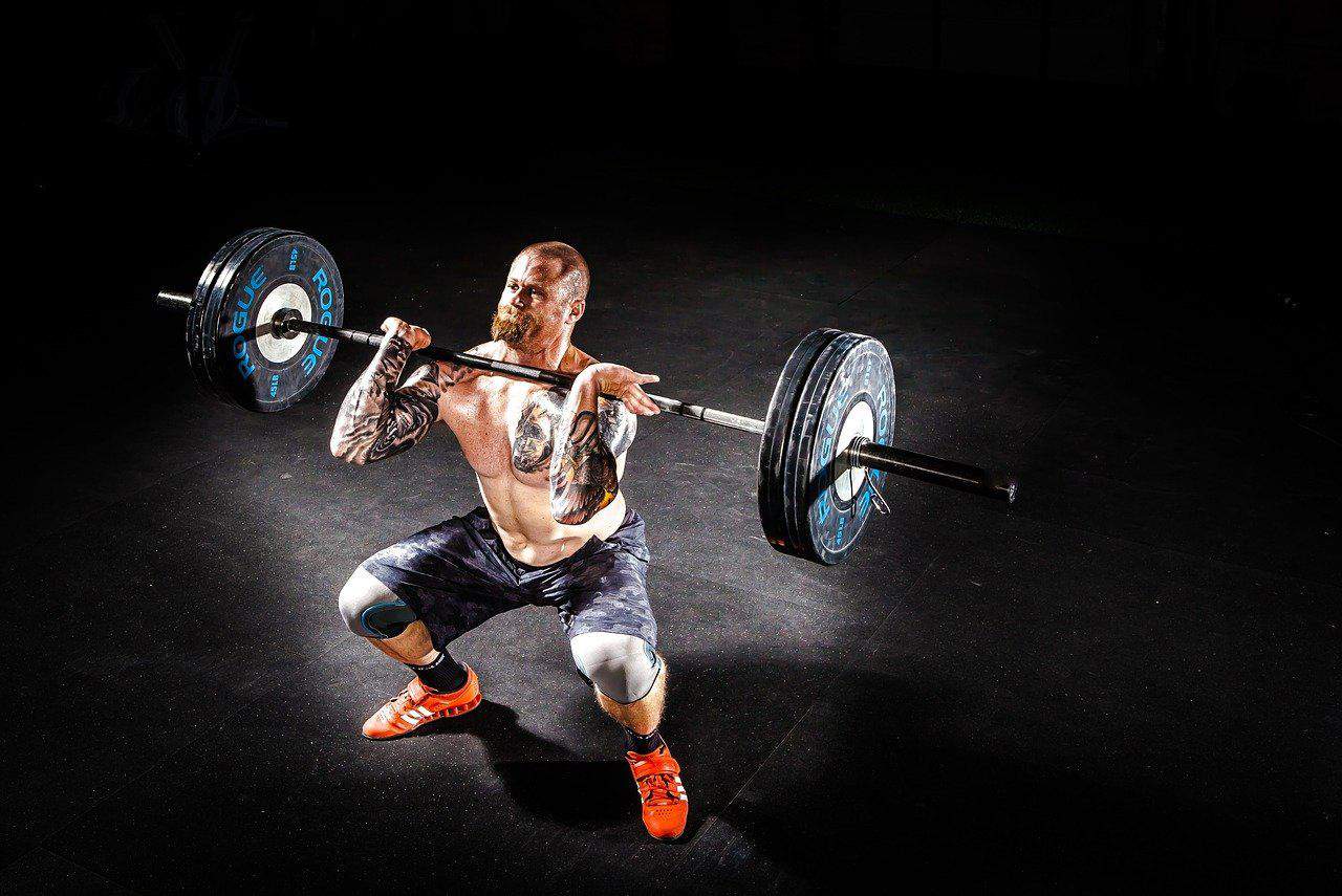 barbell overhead press man exercise