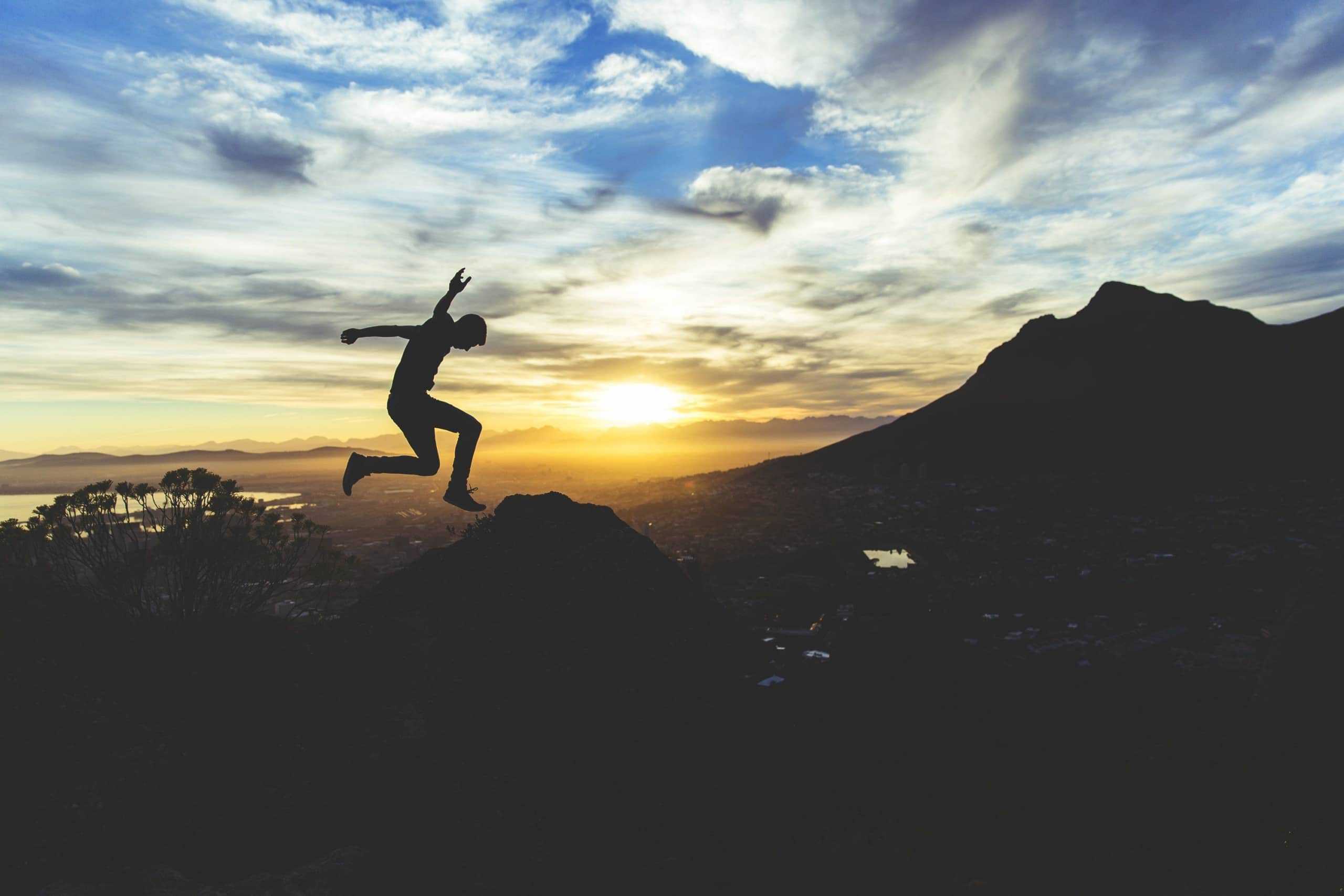 man jump nature sundown