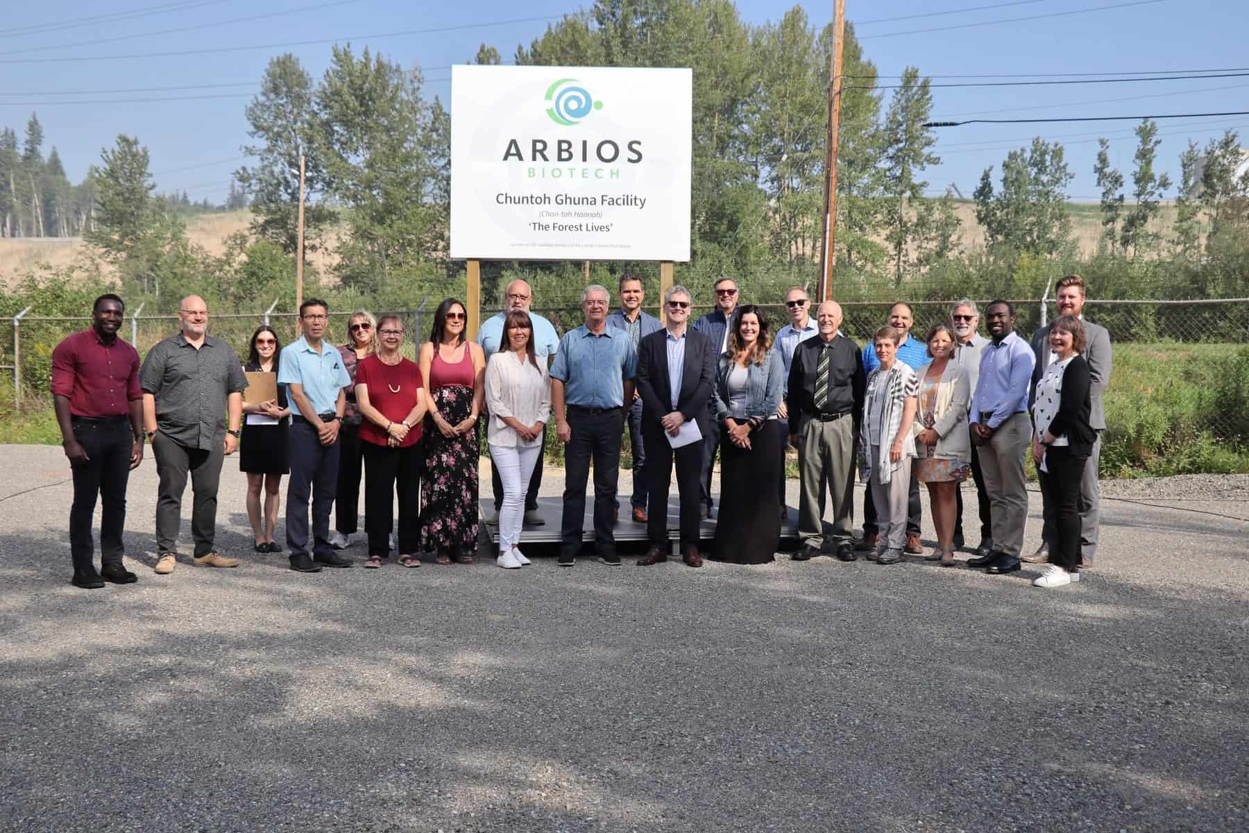 People stand in a group to name the Arbios facility Chuntoh Ghuna