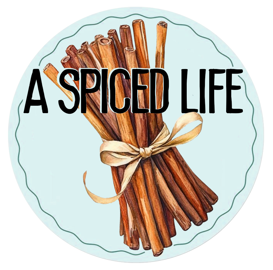 A Spiced Life food blog logo featuring a watercolor bundle of cinnamon sticks tied with a ribbon on a light blue background