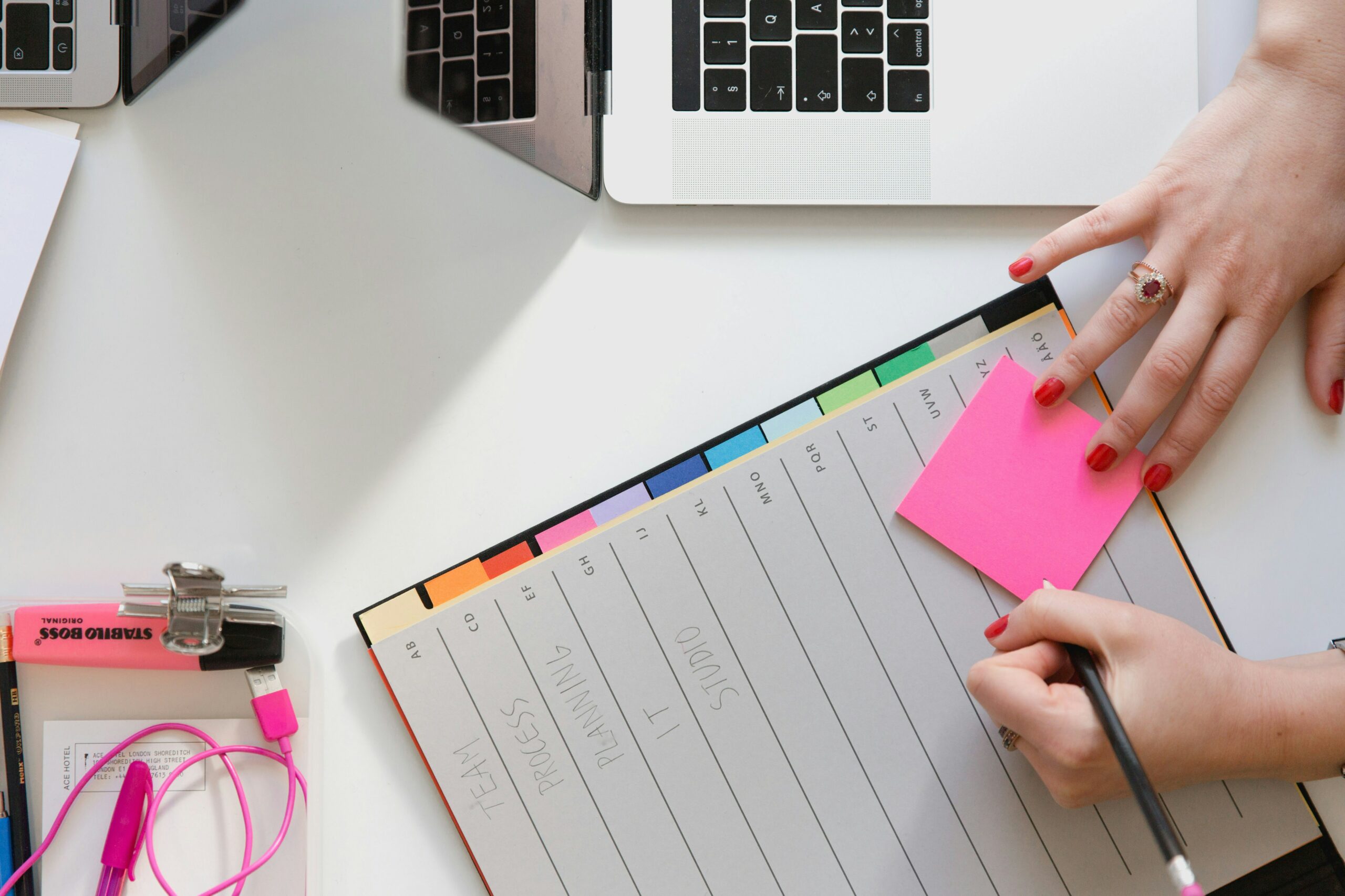 Planner on desktop. Photo by Marten Bjork on Unsplash