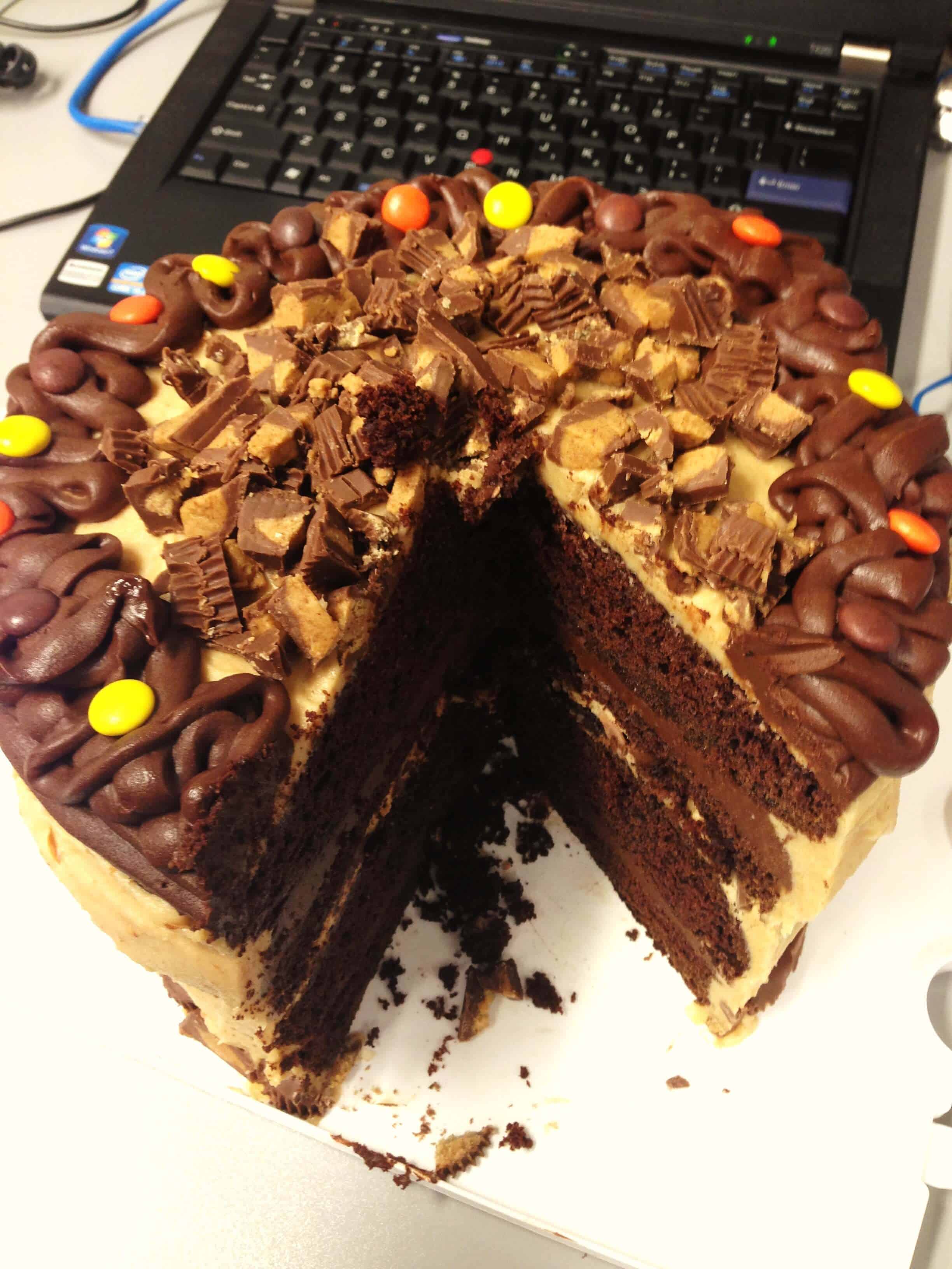 image of a reese's peanut butter cup cake that's been sliced into