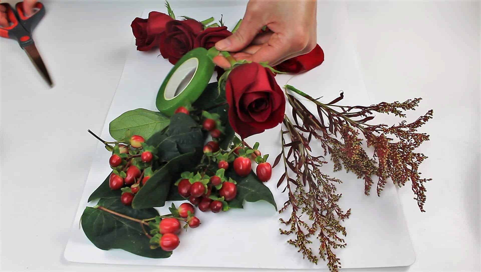 photo of wrapping flower stems with floral tape