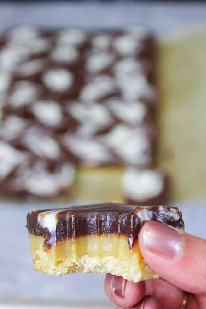 image of bitten into millionaire bar