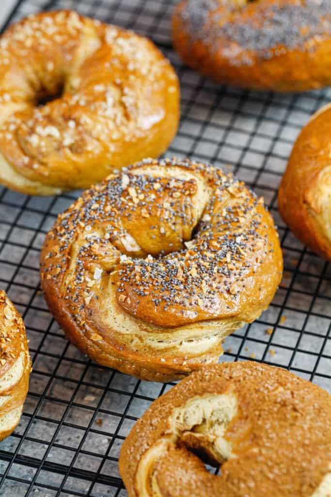 image of homemade bagels cooling on a wire rack