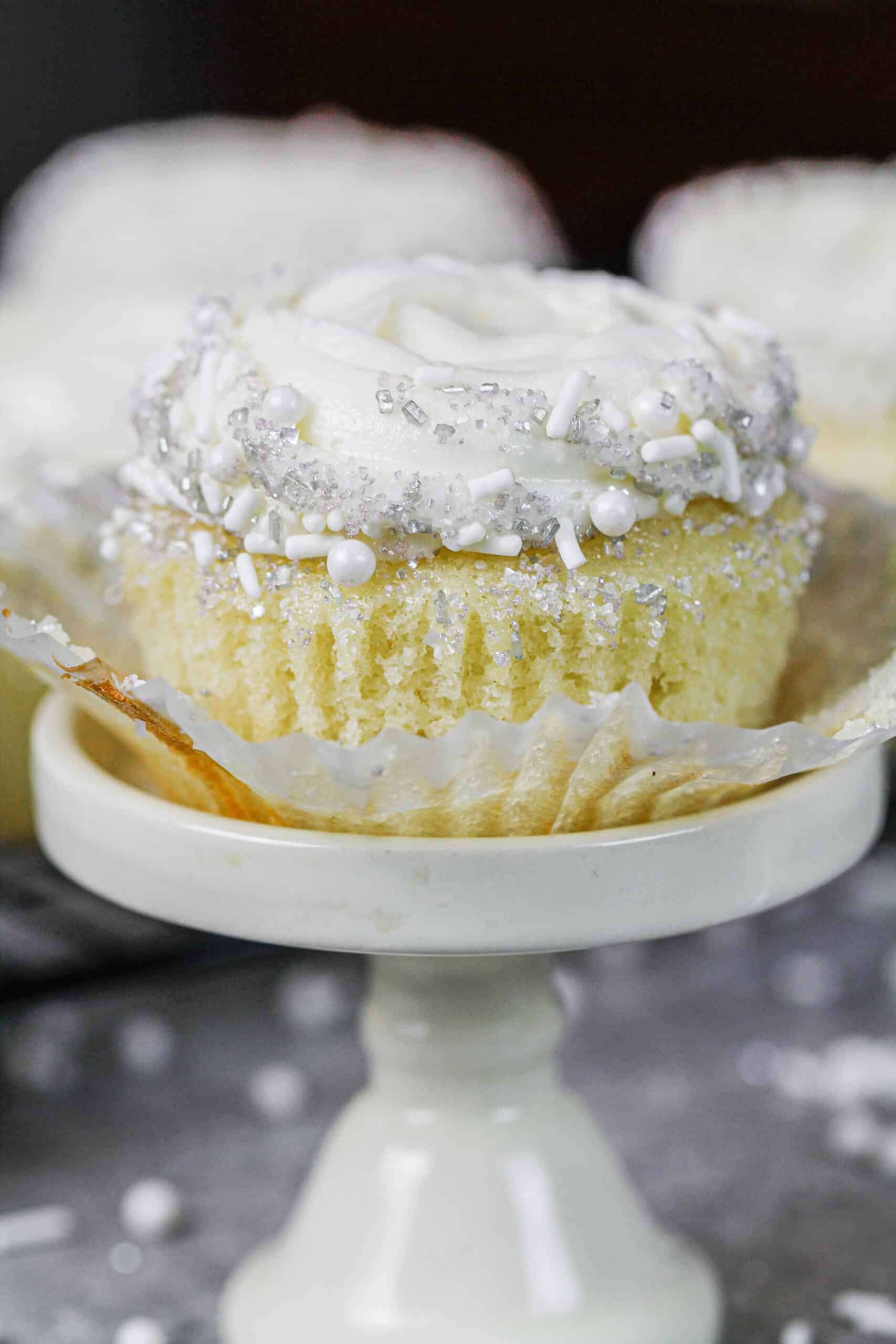 image of an almond cupcake frosted with almond buttercream