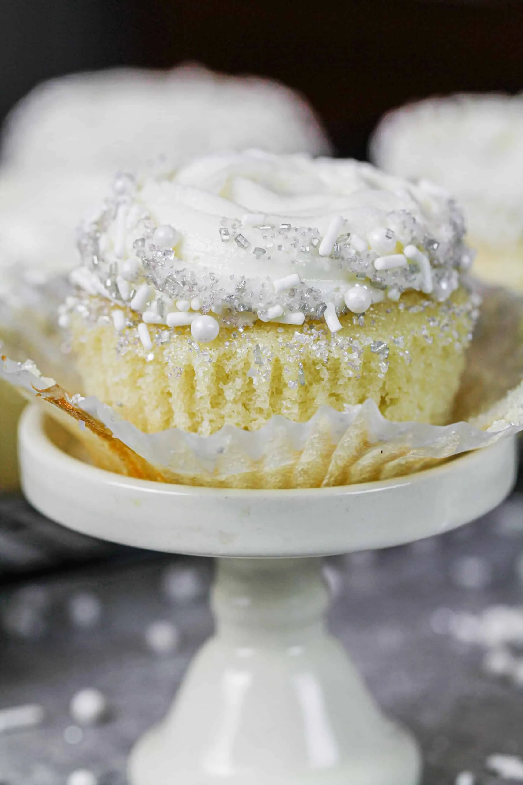 image of an almond cupcake frosted with almond buttercream