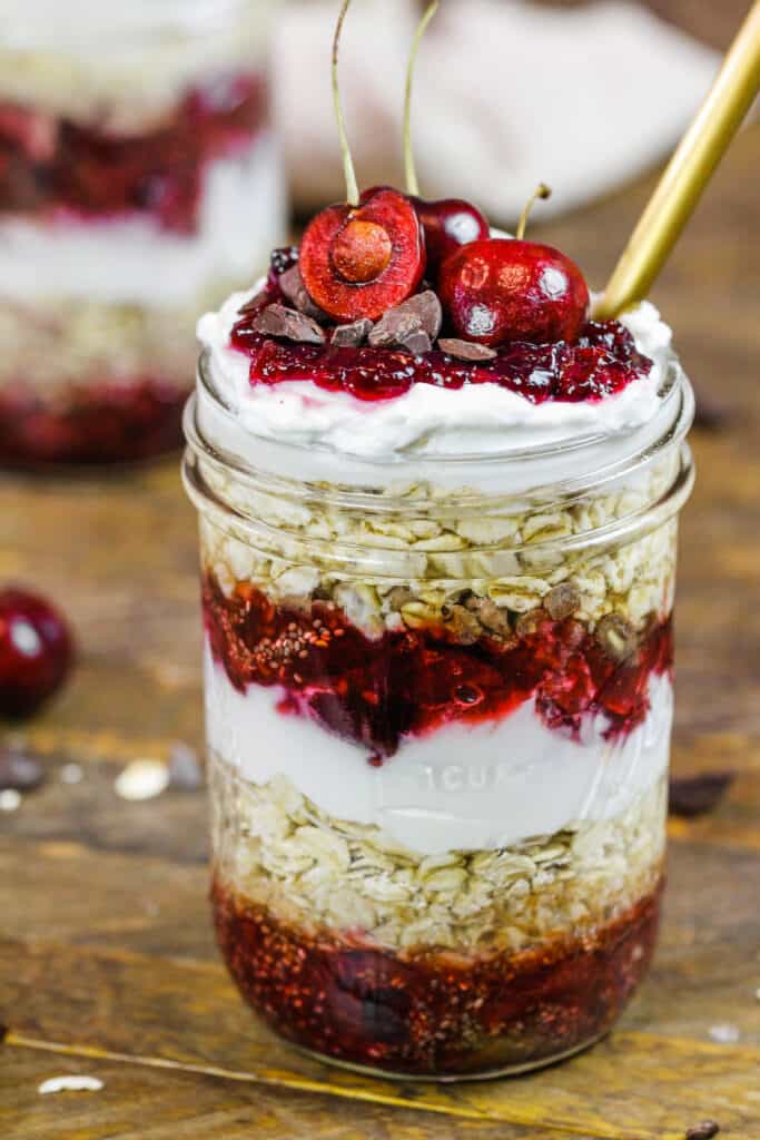 image of cherry overnight oats in a cute mason jar