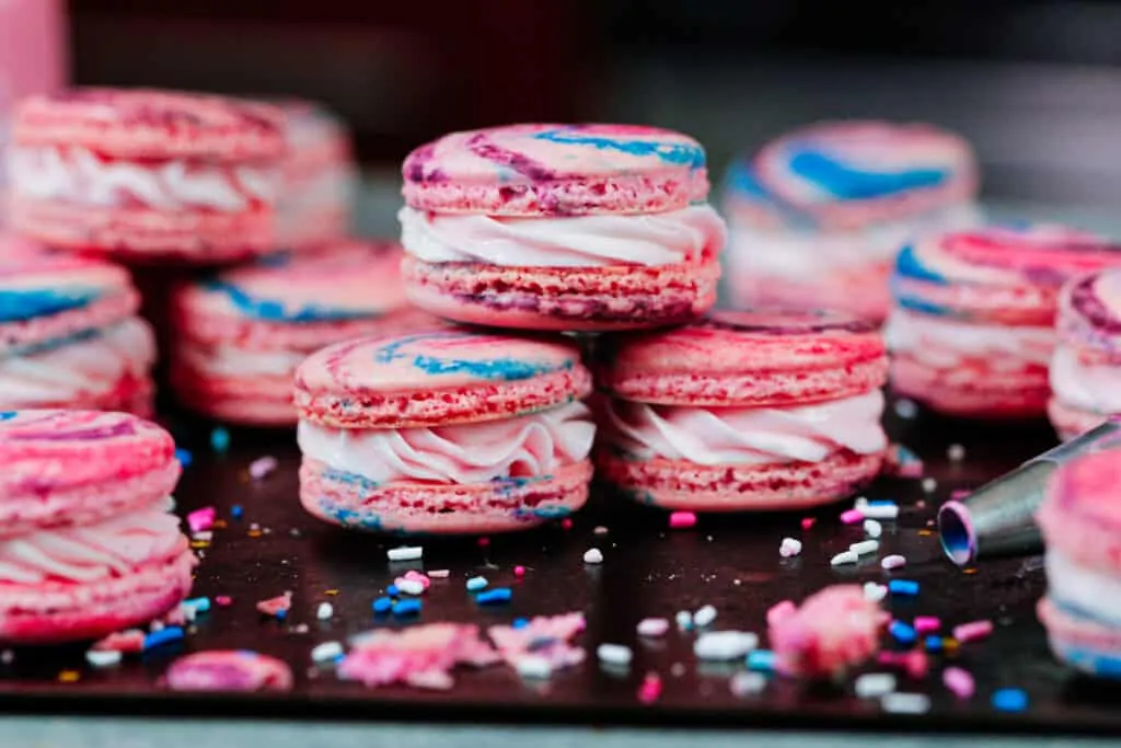 image of pink cotton candy macarons filled with cotton candy buttercream