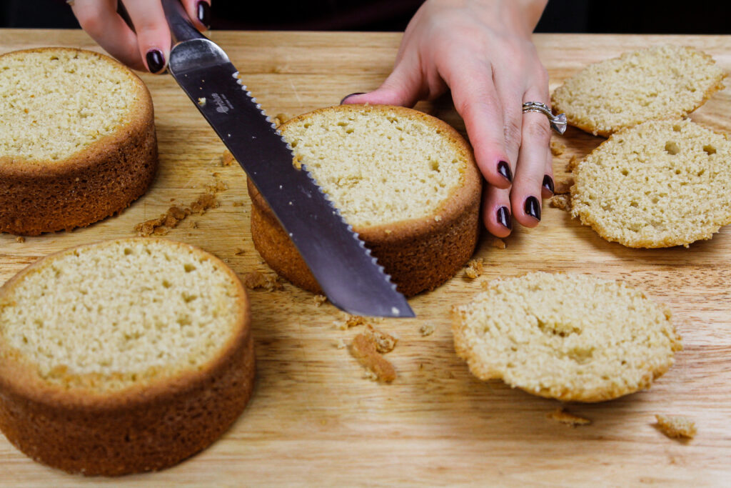image of little 4-inch cake layers being leveled to make a layer cake