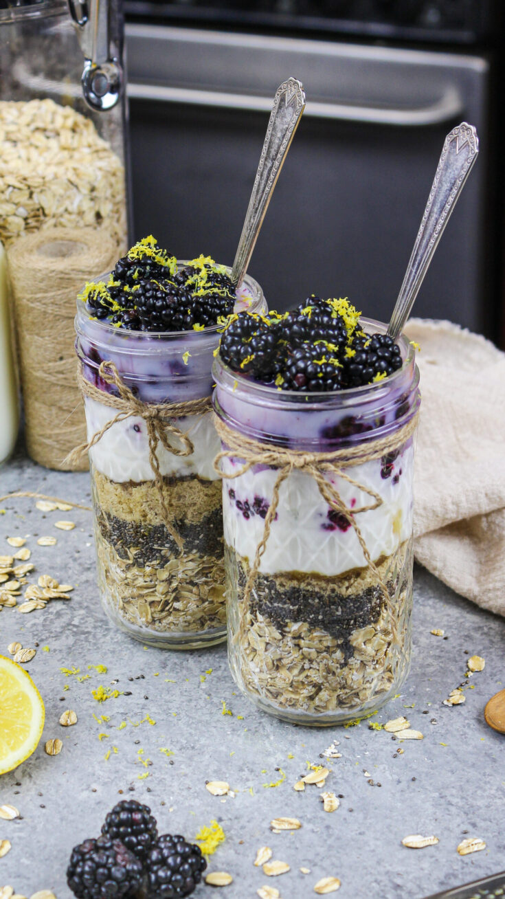 image of blackberry overnight oats made in advance in cute mason jars