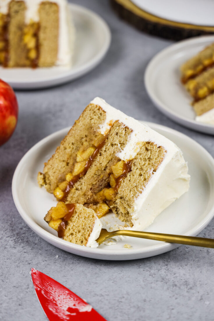 image of a slice of salted caramel apple cake on plate