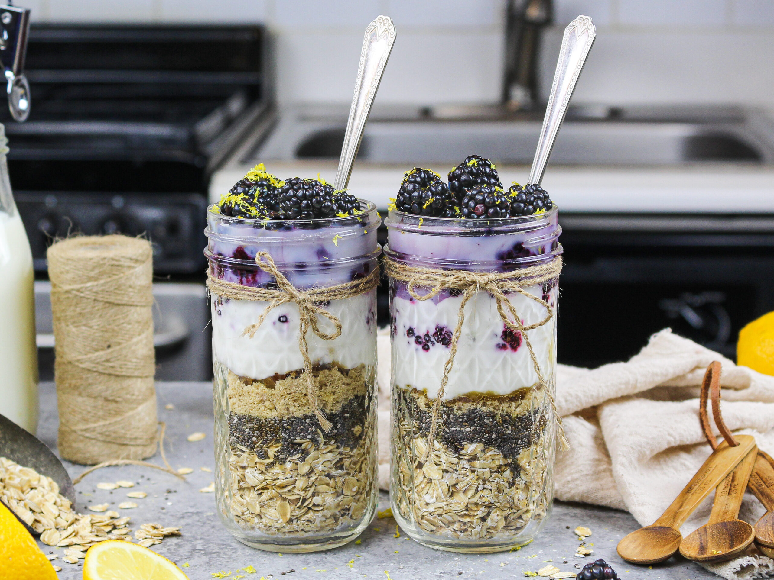 image of blackberry overnight oats made in advance in cute mason jars