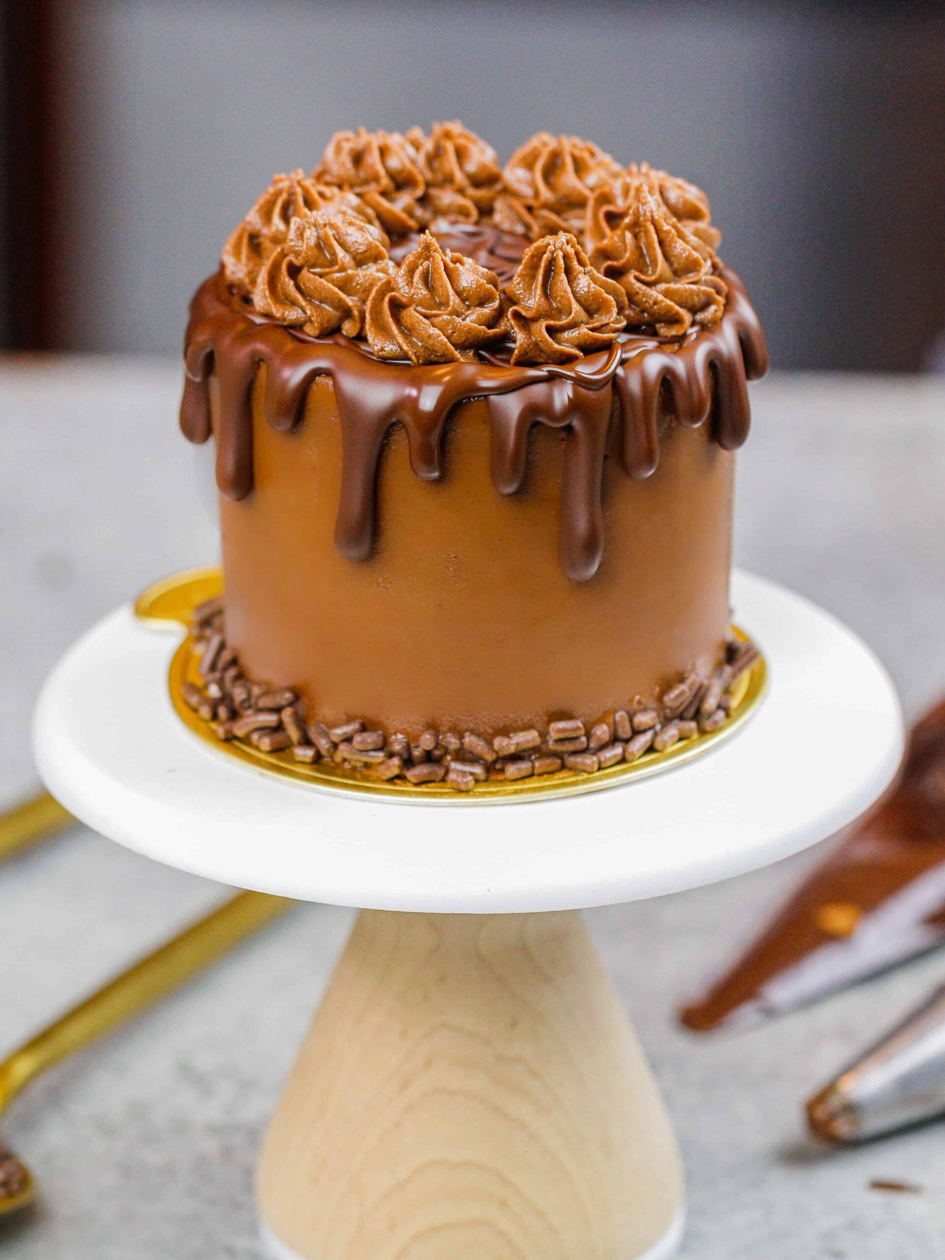 image of a mini chocolate cake made with 3-inch cake layers