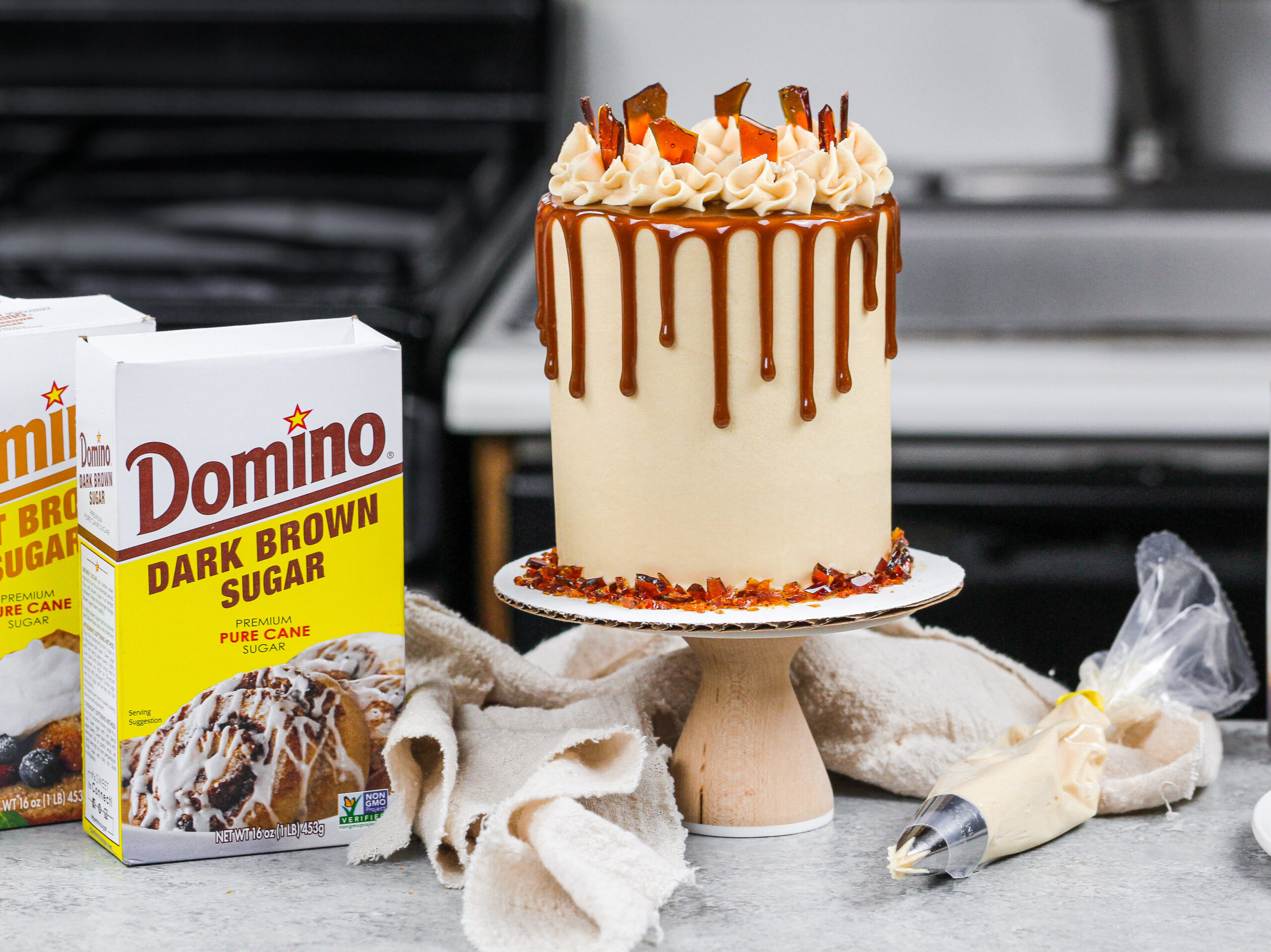 image of a mini brown sugar caramel drip cake made with 4-inch cake layers