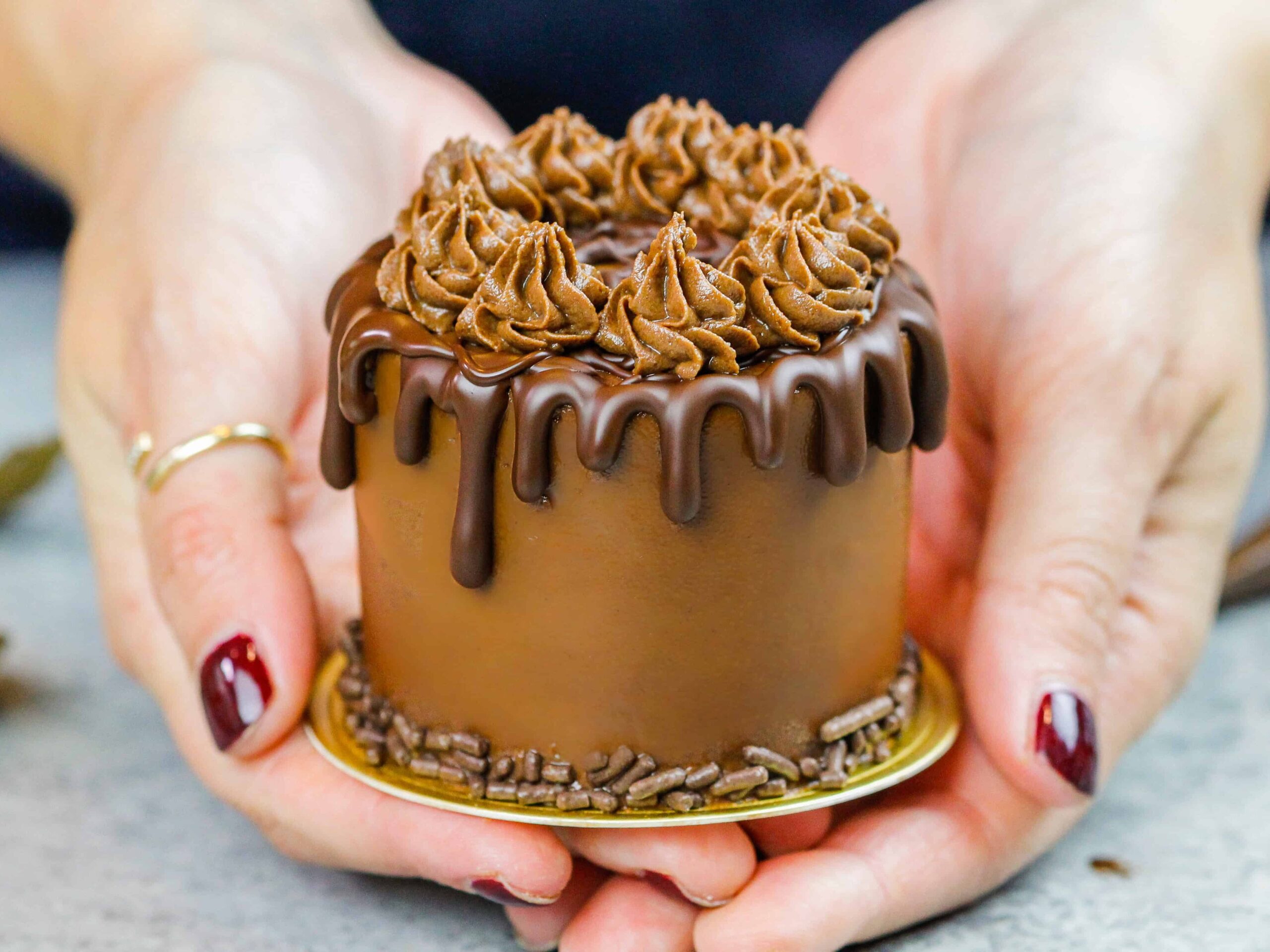 image of a mini chocolate cake made with 3-inch cake layers