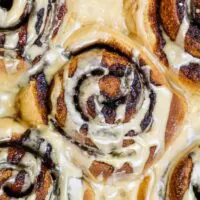 image of coffee cinnamon rolls covered in coffee glaze