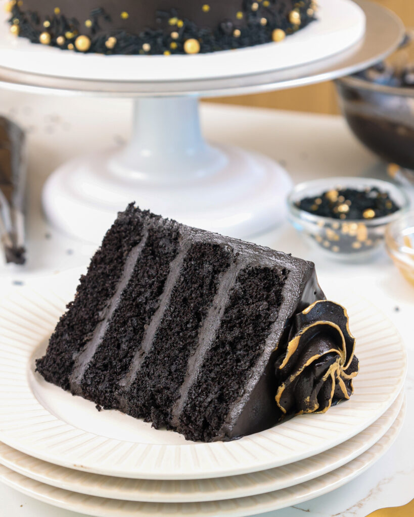 image of a slice of black velvet cake on a plate
