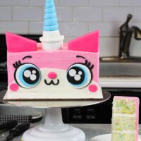 image of unikitty cake made with funfetti cake layers