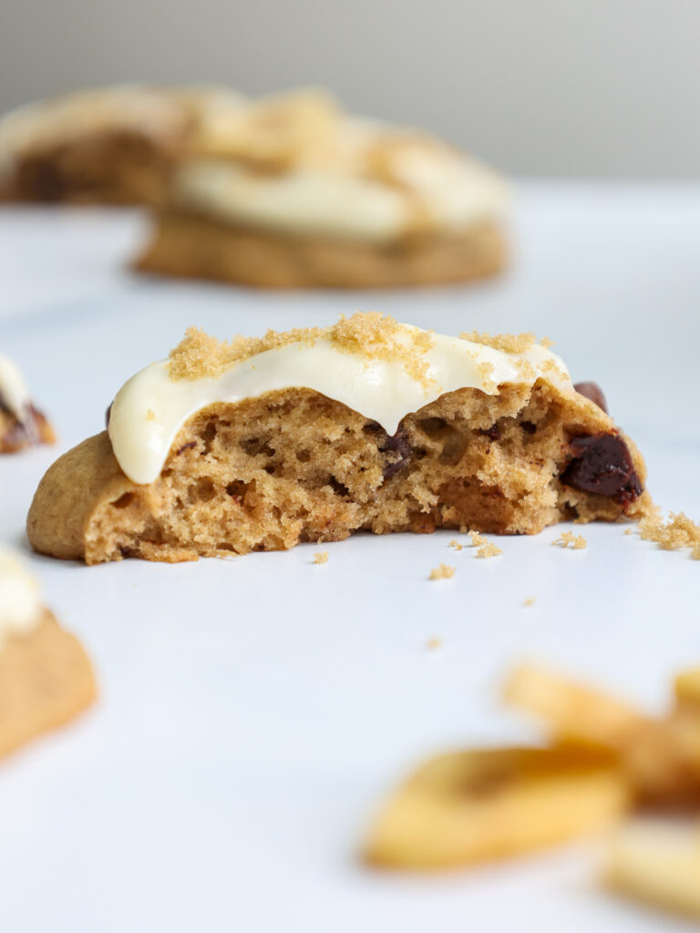 image of a soft banana cookie that's been bitten into to show it's super tender and soft texture