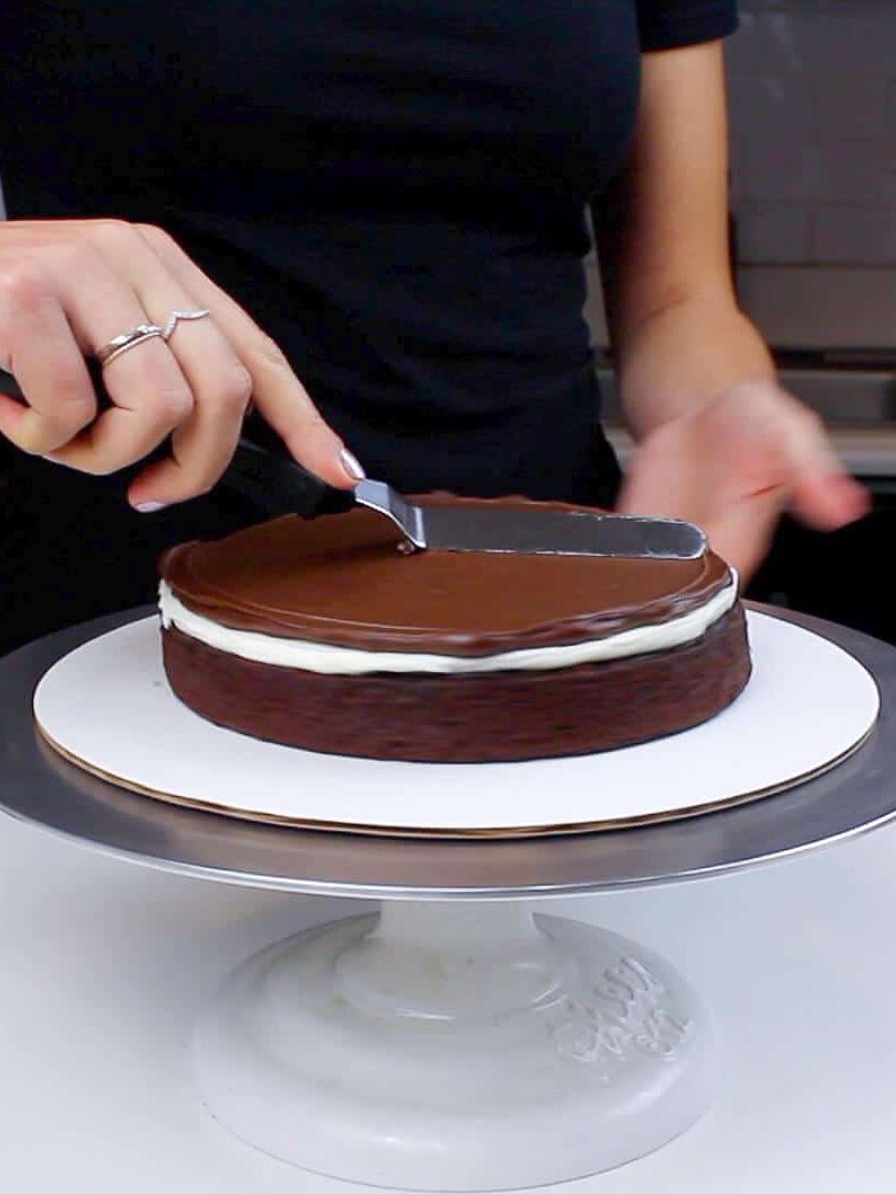 spreading ganache onto hot cocoa cake-2