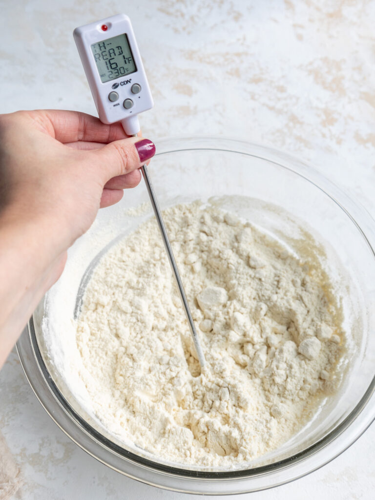 image of flour being heat treated and tested with a thermometer