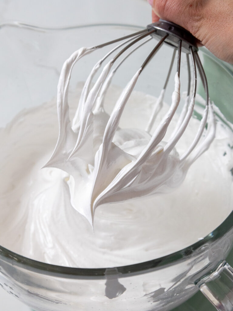 image of Swiss meringue that's been whipped until it reached the stiff peak stage